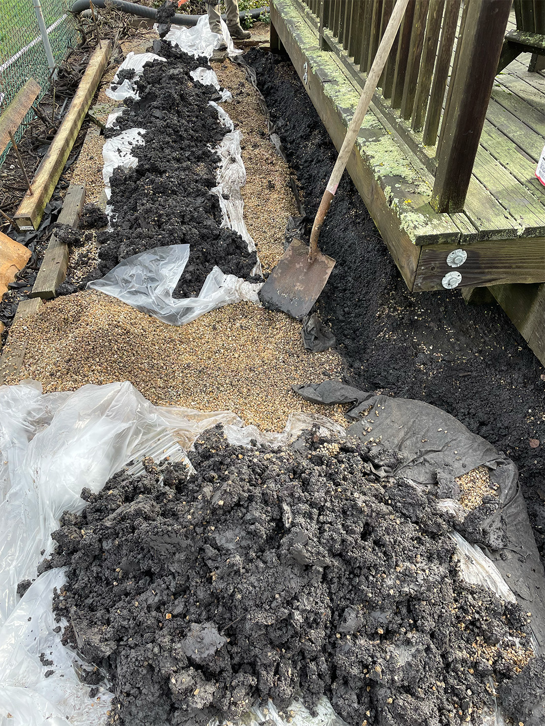 Trenching dug around our client's deck to Get Rid of Skunks and Raccoons